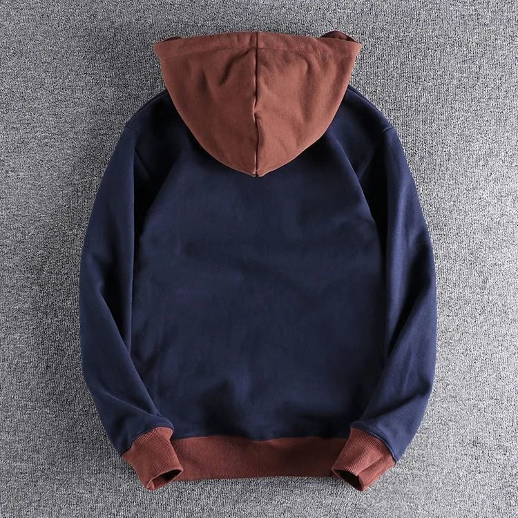 Comfortable & durable men's quarter-zip hoodie, perfect for layered everyday fashion & urban style outerwear.