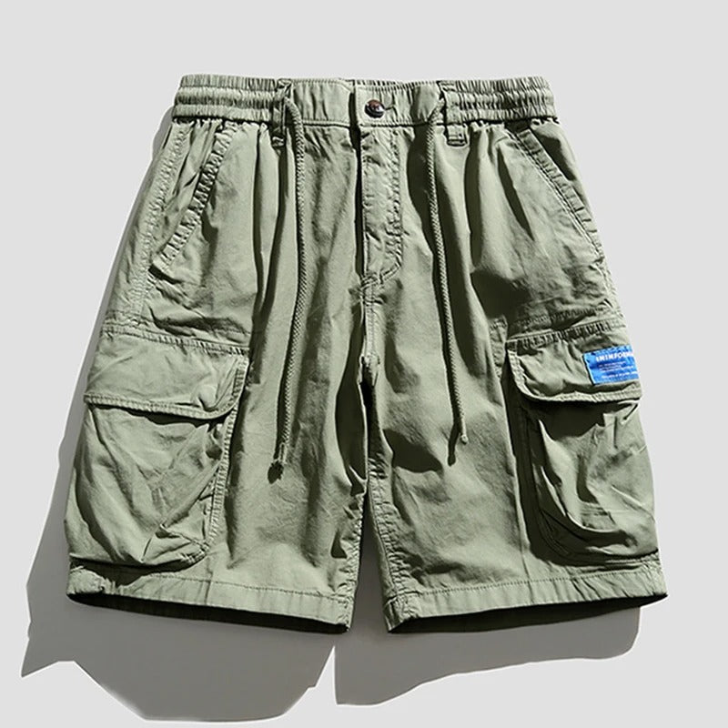 Comfortable men's cargo shorts with stretch waistband, ideal for casual wear & warm weather.