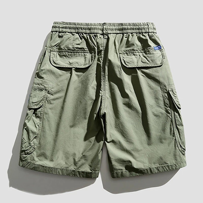 Northbay utility shorts for men, featuring multiple pockets & relaxed fit for outdoor attire.