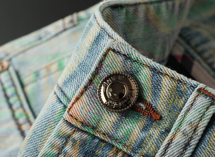Expressive men's Nova slim fit jeans with bold, artistic patterns; comfortable, unique style choice.