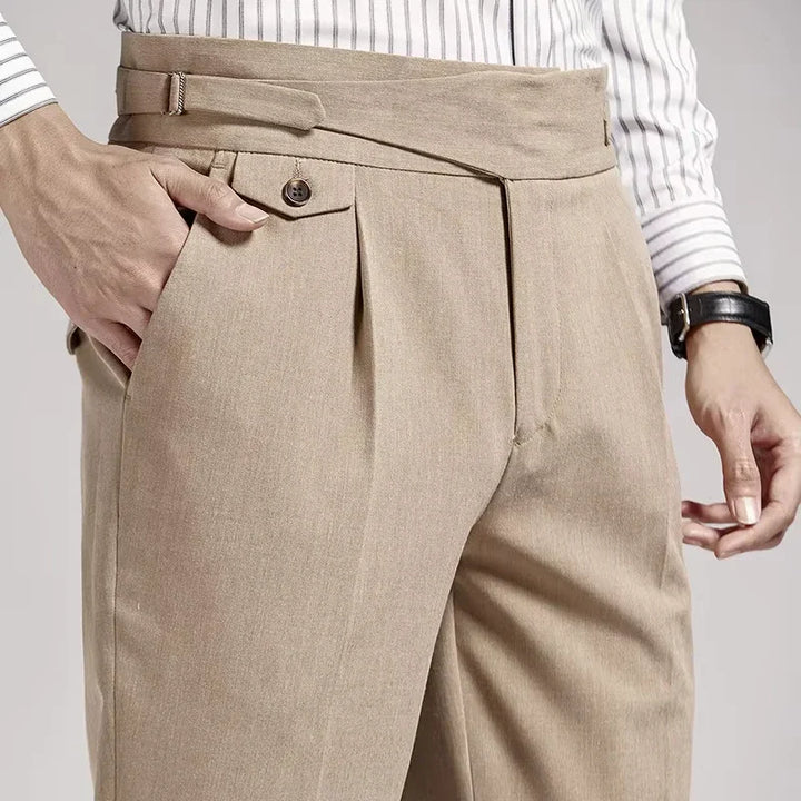 Side view: Classic men's pleated trousers, old money style. Tailored fit dress pants for a refined formal look.