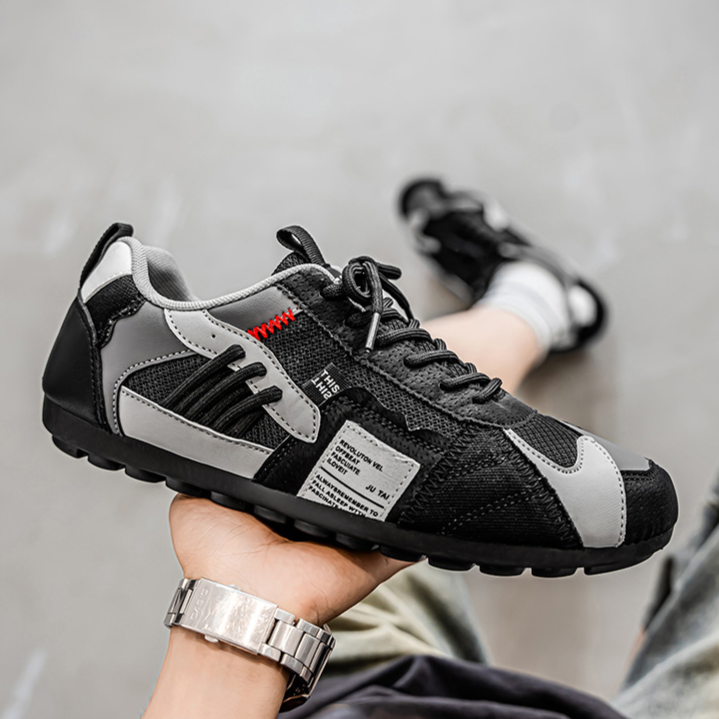 Athletic men's utility footwear, built for urban exploration with a rugged style.