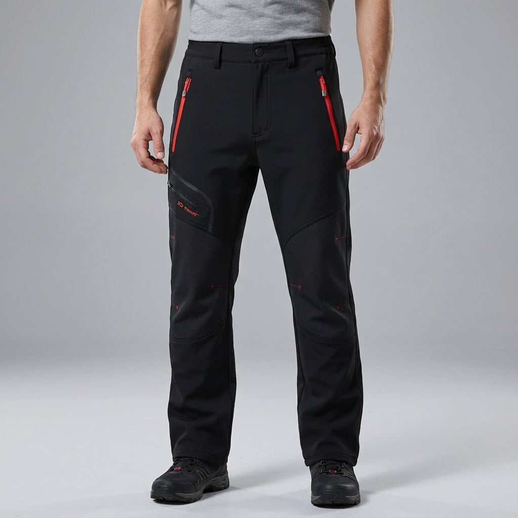 Close-up of men's stretch outdoor winter trousers in black, showing waterproof fabric and durable stitching