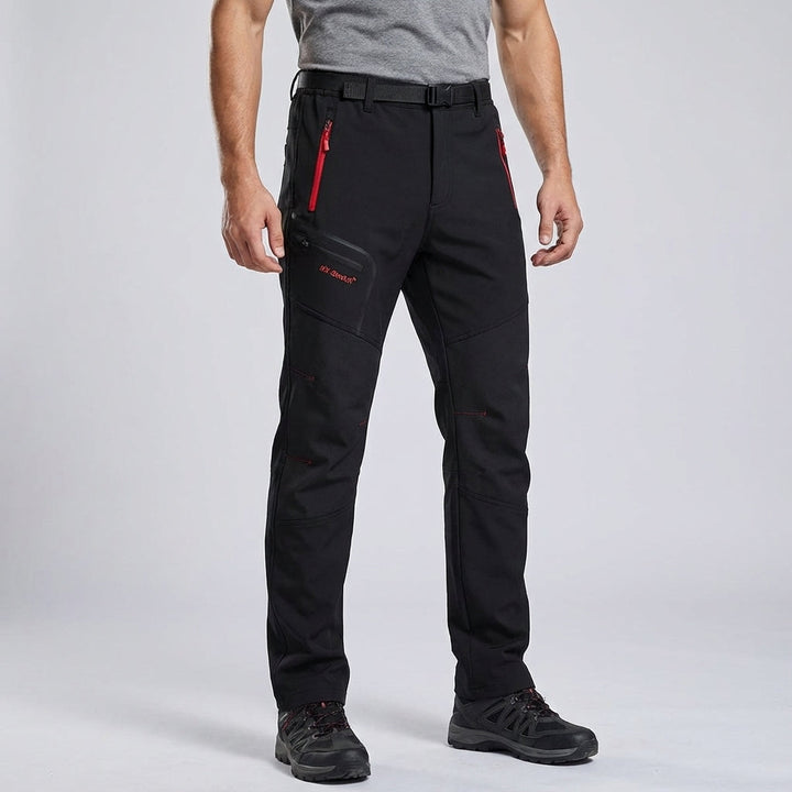 Fleece-lined interior of men's cold weather outdoor trousers, showcasing warmth for winter sports