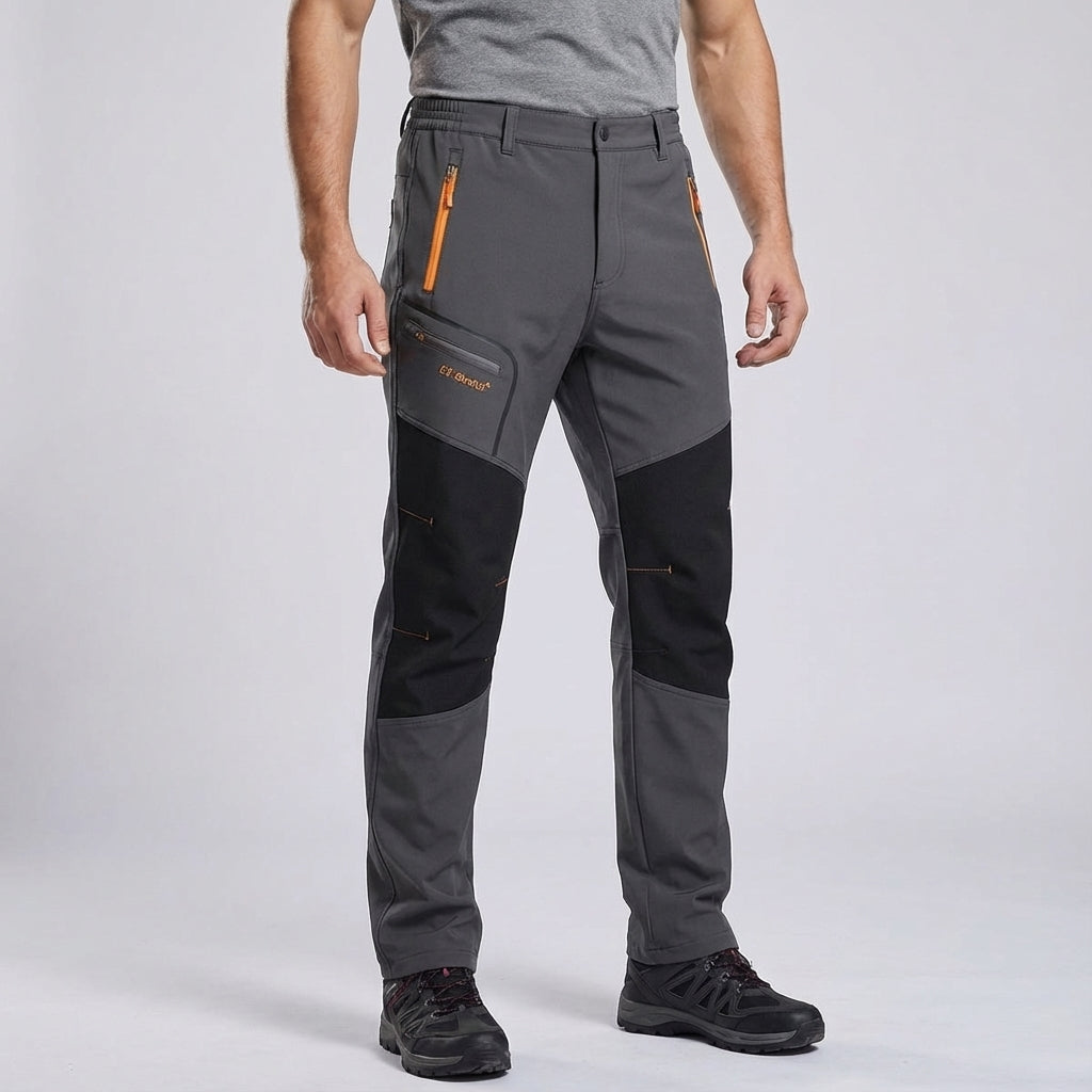 Detail of a man's leg wearing Orlando outdoor trekking pants, highlighting the stretch material