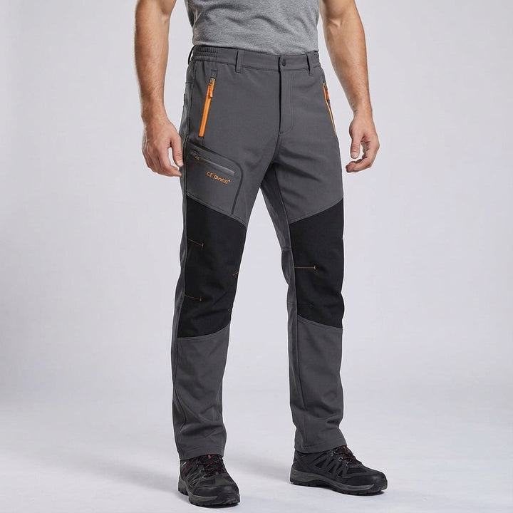 Detail of a man's leg wearing Orlando outdoor trekking pants, highlighting the stretch material