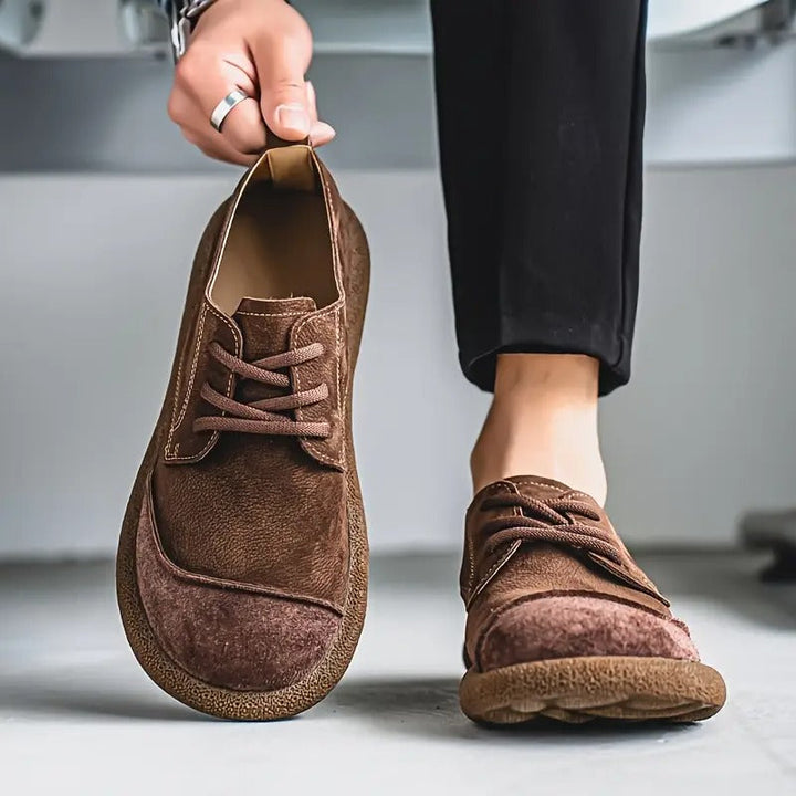Premium leather men's slip-on casual loafers, handmade with breathable orthopedic comfort.
