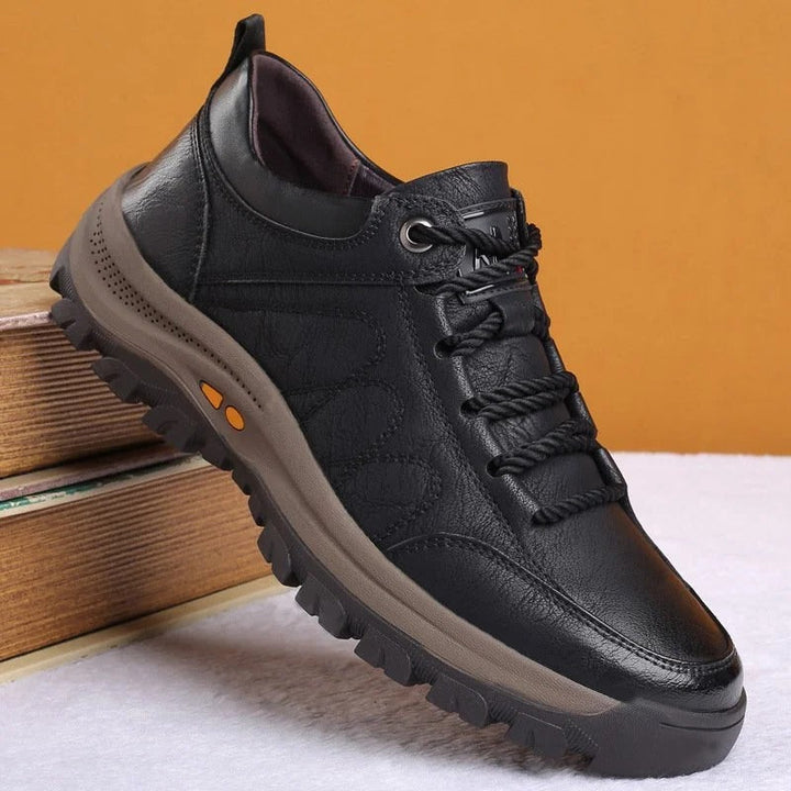 Non-slip, waterproof sole of men's orthopedic walking shoes providing excellent traction and foot support.