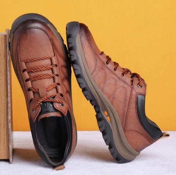 Pair of men's brown orthopedic leather shoes, designed for ultimate comfort, foot support, and durability.