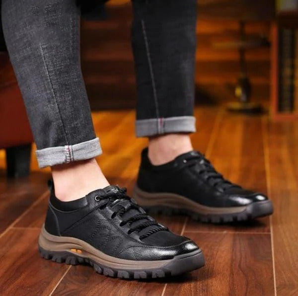 Angled view of men's durable orthopedic brown leather shoes for casual wear, walking, and foot support.