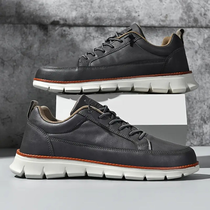 Pair of men's orthopedic sneakers. Comfort footwear for walking, providing all-day support & style.