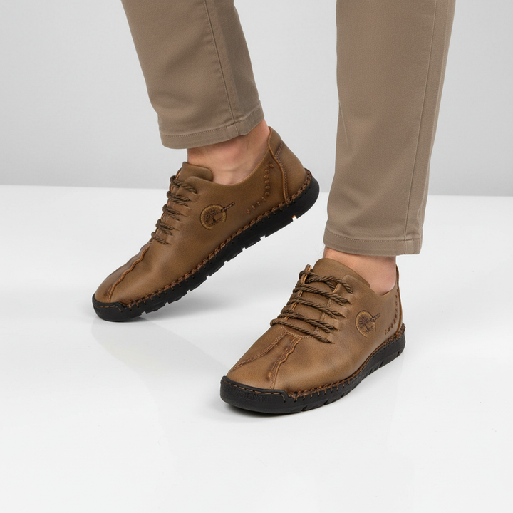 Orthopedic men's leather sneakers in a neutral tone, designed for all-day comfort and support.
