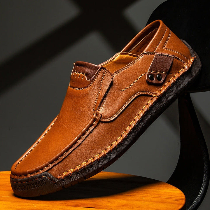 Premium leather men's slip-on loafers, orthopedic comfort footwear with memory foam insoles.