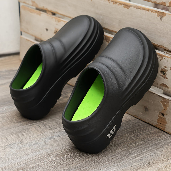 Men's orthopedic waterproof clogs in black, offering all-day comfort & foot support.