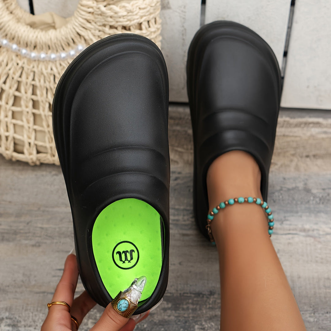 Waterproof men's clogs for gardening & work, featuring orthopedic support & slip-on design.