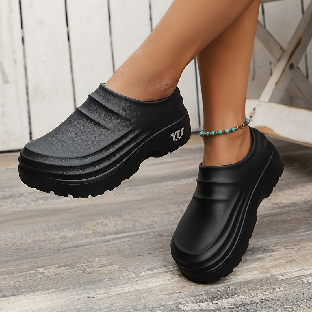 Ergonomic men's orthopedic clogs, ideal for hospitality, with pain relief & waterproof design.