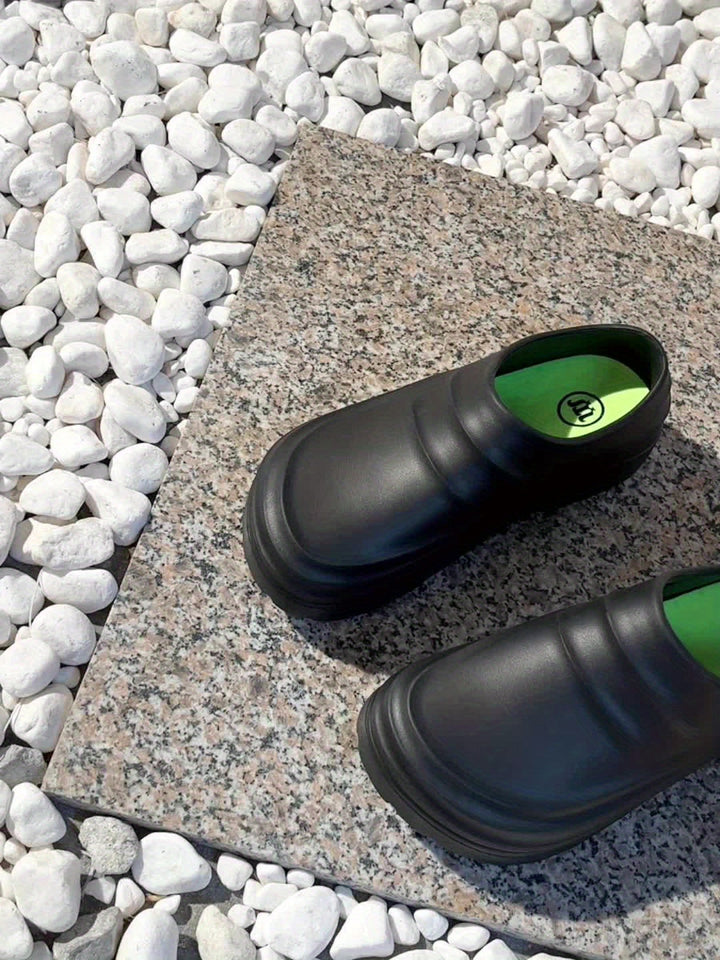 Durable men's waterproof clogs with advanced orthopedic support for active professionals.