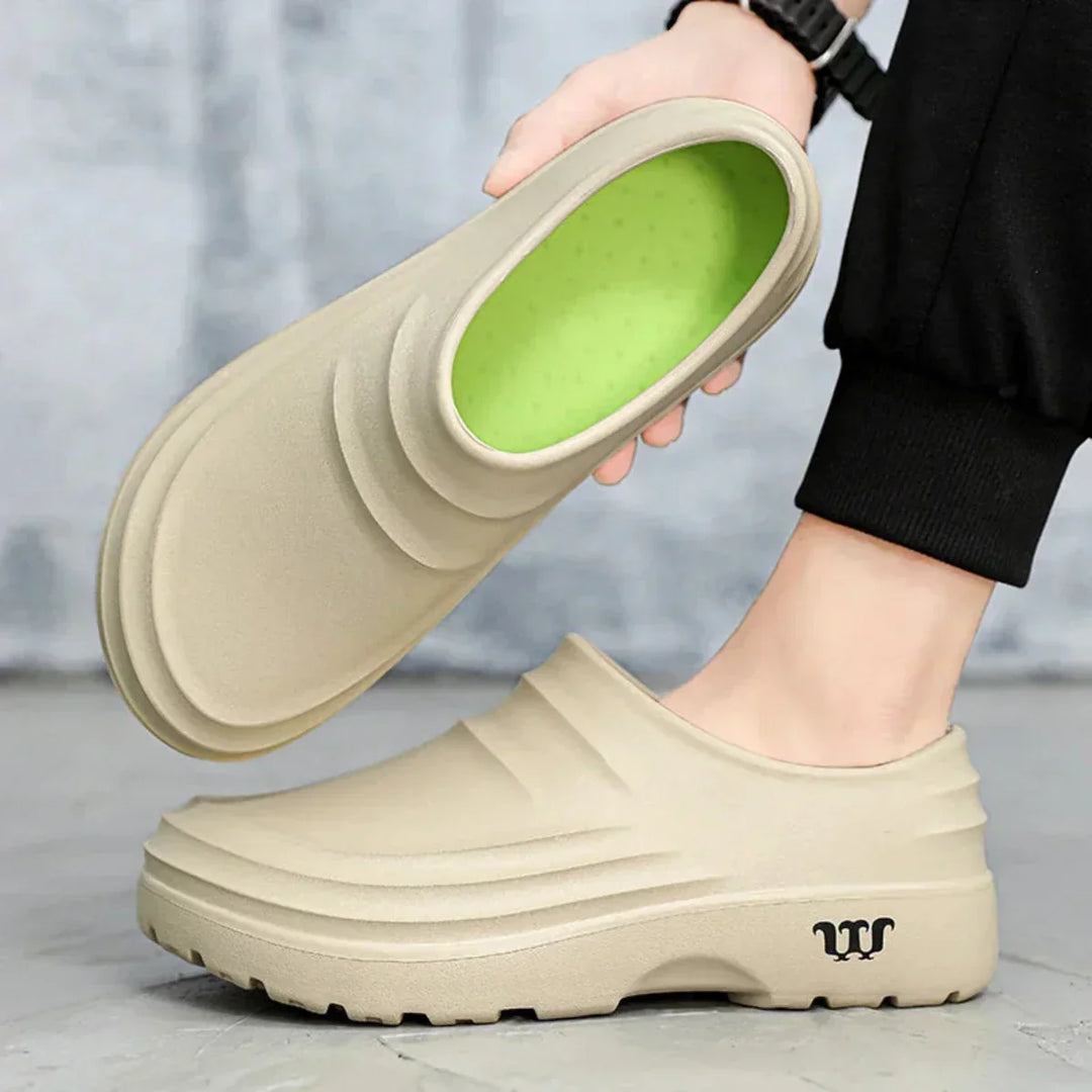 Stylish waterproof men's clogs with ergonomic design, perfect for long shifts & foot pain relief.