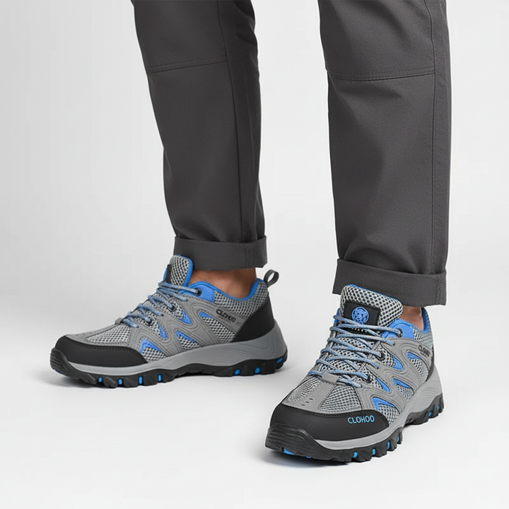 Close-up of men's trail running shoes featuring breathable mesh and strong traction outsole