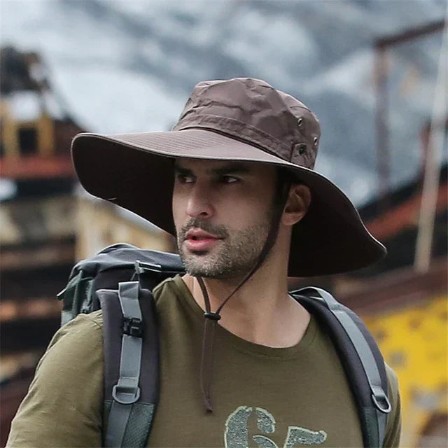 Durable men's summer bucket hat with chin strap & wide brim for ultimate sun protection during outdoor sports.