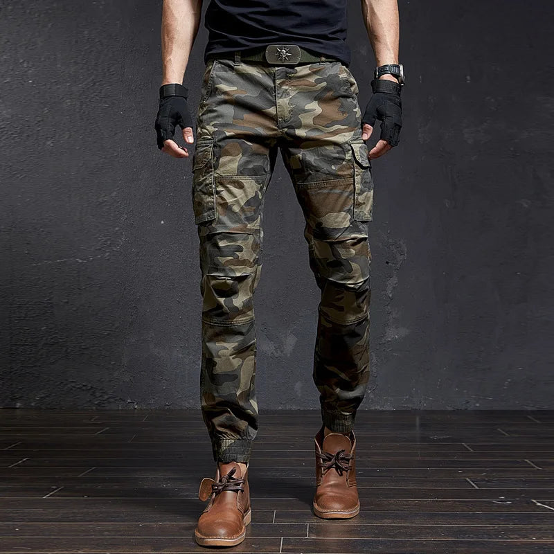 Stylish men's Outland tactical cargo pants, tapered for comfort and everyday wear, perfect for casual or adventure.