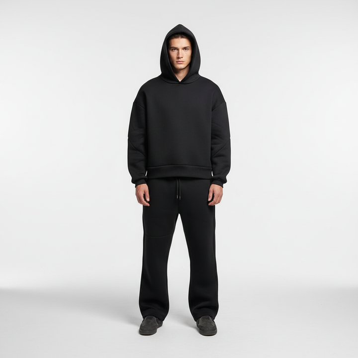 Front view of men's oversized forest green hoodie and joggers tracksuit, comfortable fit