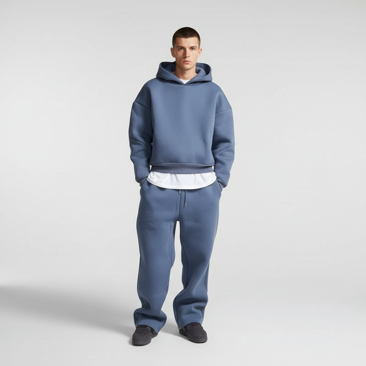 Close-up of the fabric texture of a men's oversized hoodie and joggers tracksuit