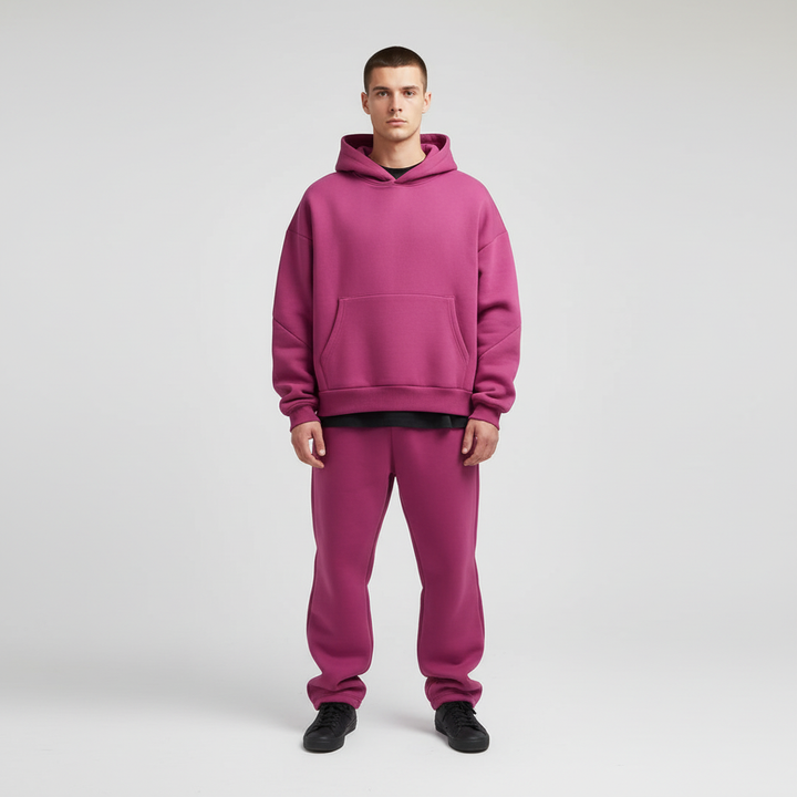 Men's oversized hoodie and joggers set in a light grey, perfect for loungewear