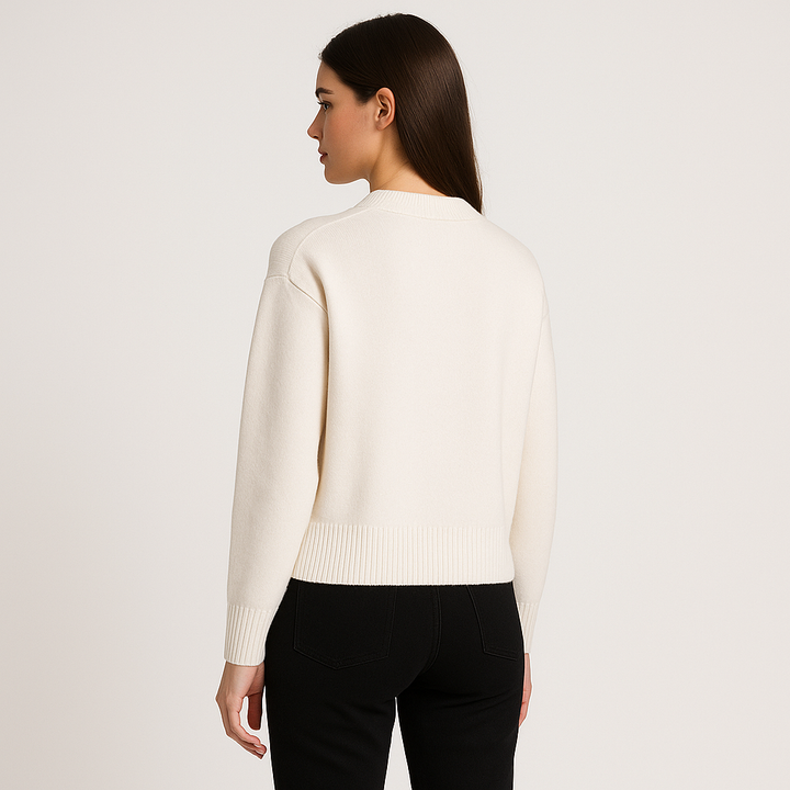 Relaxed fit men's pullover sweater with a trendy heart motif design, ideal for a comfortable, casual style.