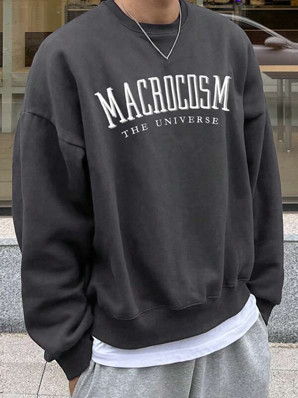 Comfy men's oversized crewneck sweatshirt featuring a unique graphic print, ideal for relaxed casual wear.