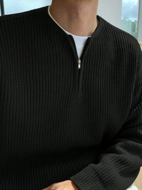 Men's comfortable oversized zip-up acrylic sweater, ideal for versatile styling and cool weather fashion.