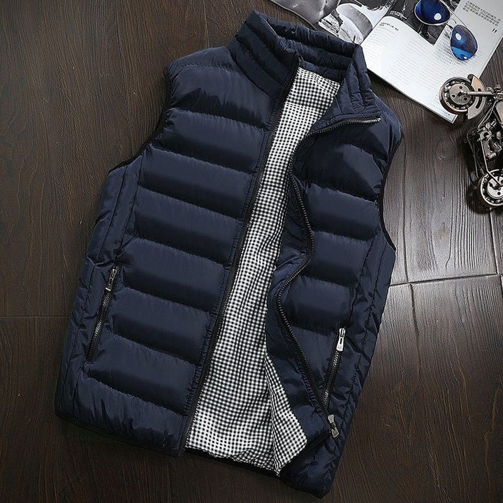 Men's casual water-repellent gilet vest, padded for warmth. Stand-up collar & lightweight for easy layering.