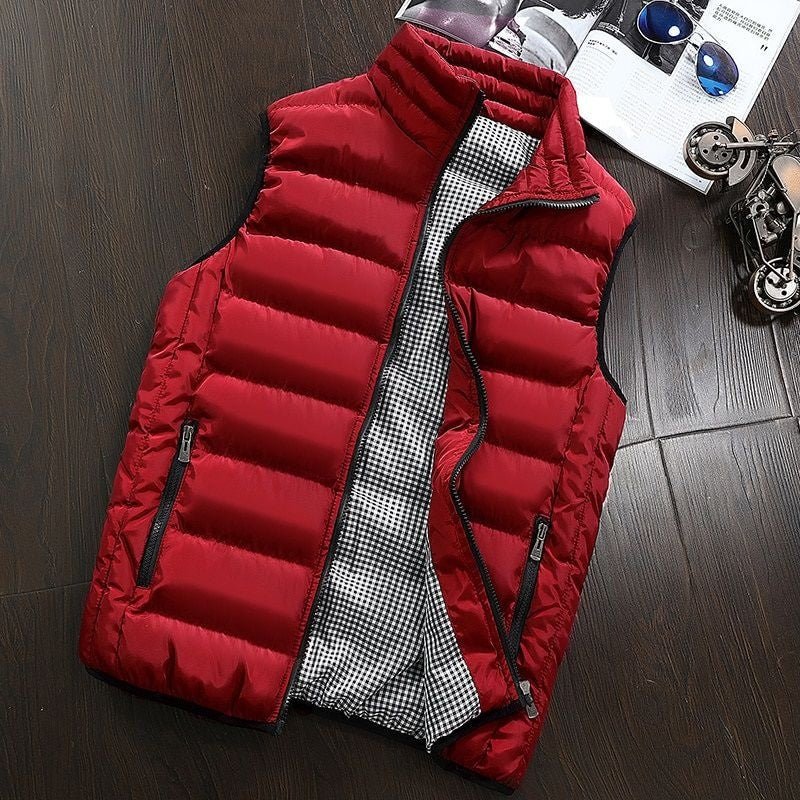 Zippered pockets & stand-up collar on this men's water-repellent padded vest. A smart gilet for everyday wear.
