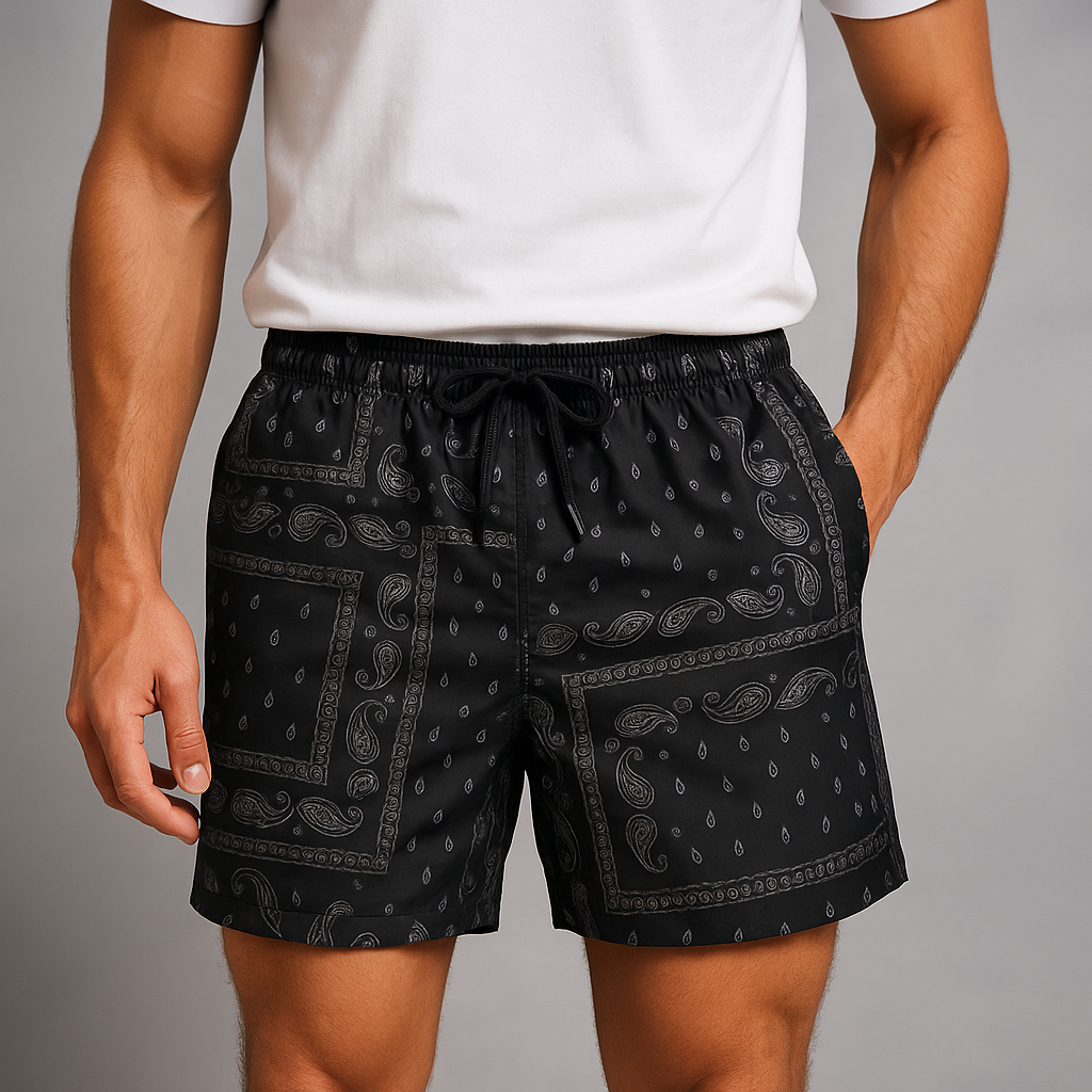 Men's workout shorts featuring a stylish paisley print. Perfect for active performance & streetwear.