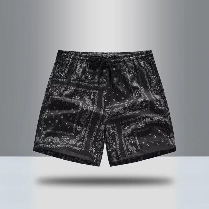 Vibrant paisley pattern on men's performance gym shorts. Great for athletic activities & casual outfits.