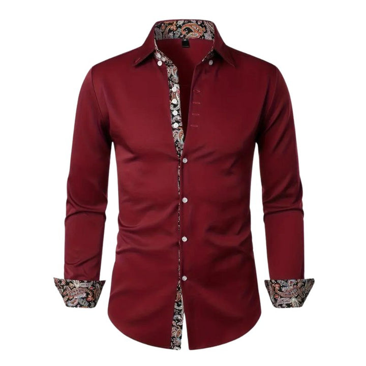 Fashionable men's slim fit dress shirt featuring a classic paisley print and long sleeves.