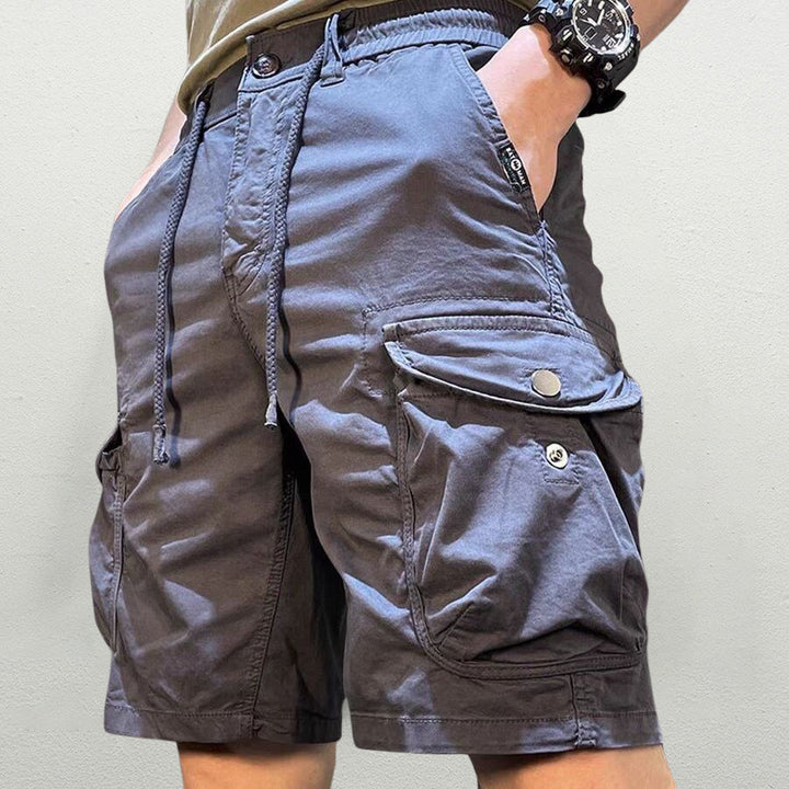 Stylish men's Palermo everyday cargo shorts, relaxed fit, featuring practical pockets & a comfortable drawstring for summer.