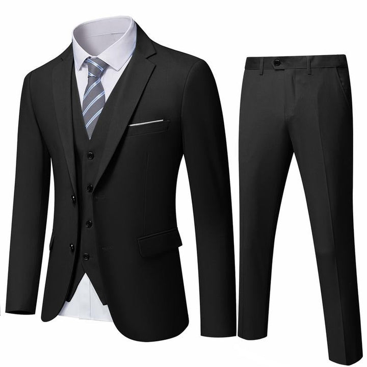 Tailored men's suit trousers, part of a three-piece formal set. Business attire for a sharp, sophisticated look.