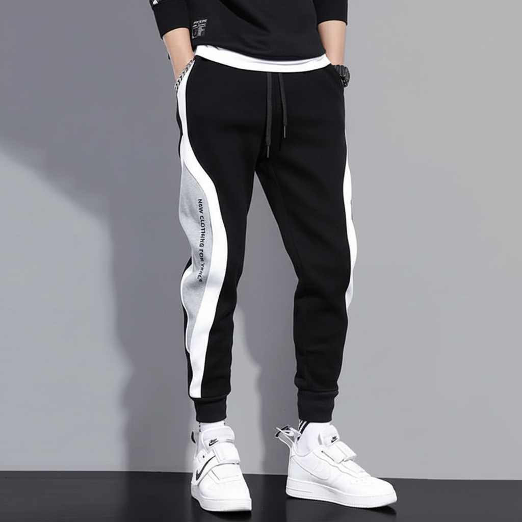 Stylish men's jogging pants with unique patchwork design, perfect for athletic activities and casual outfits