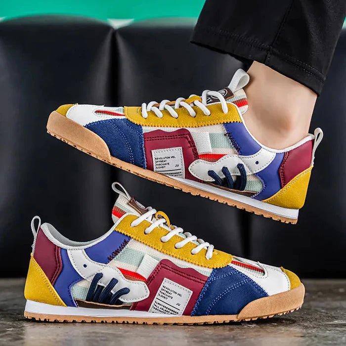 Mixed-material patchwork men's sneakers, offering a unique look and robust construction for active use.