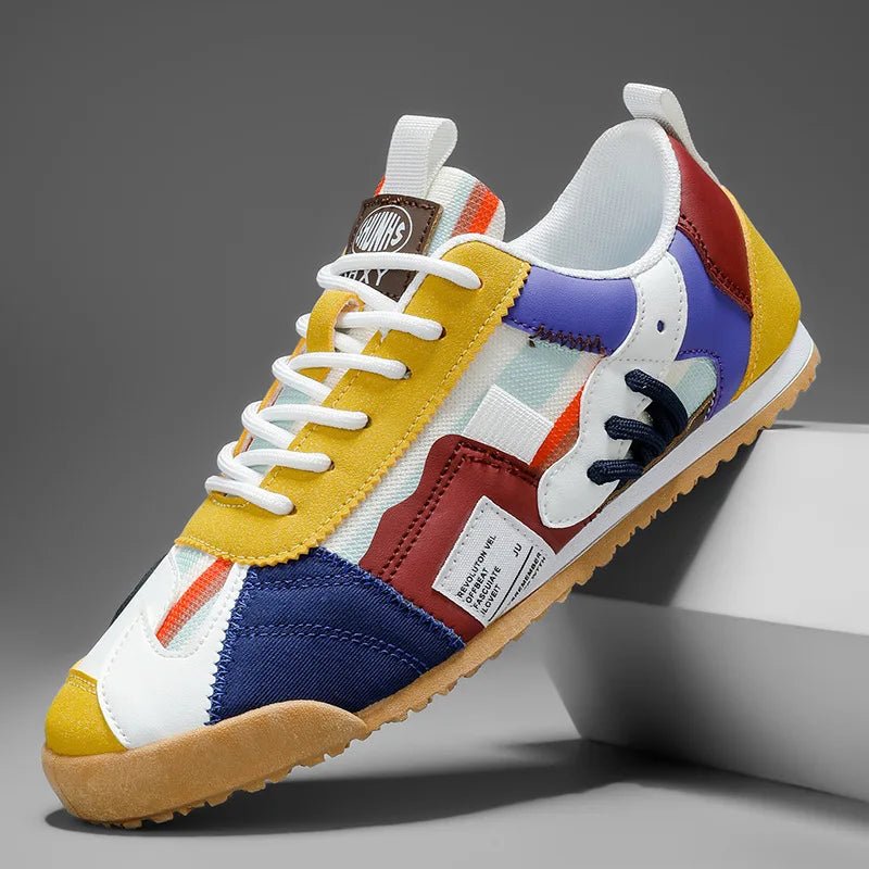 Front view of comfortable men's patchwork sneakers, ideal for active streetwear & trail adventures.