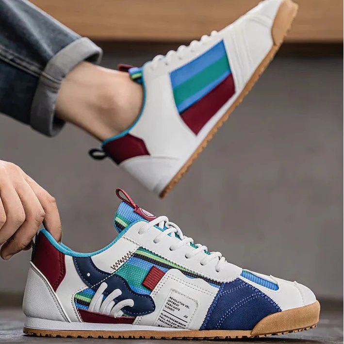 Close-up of the intricate patchwork detailing on men's casual utility sneakers.