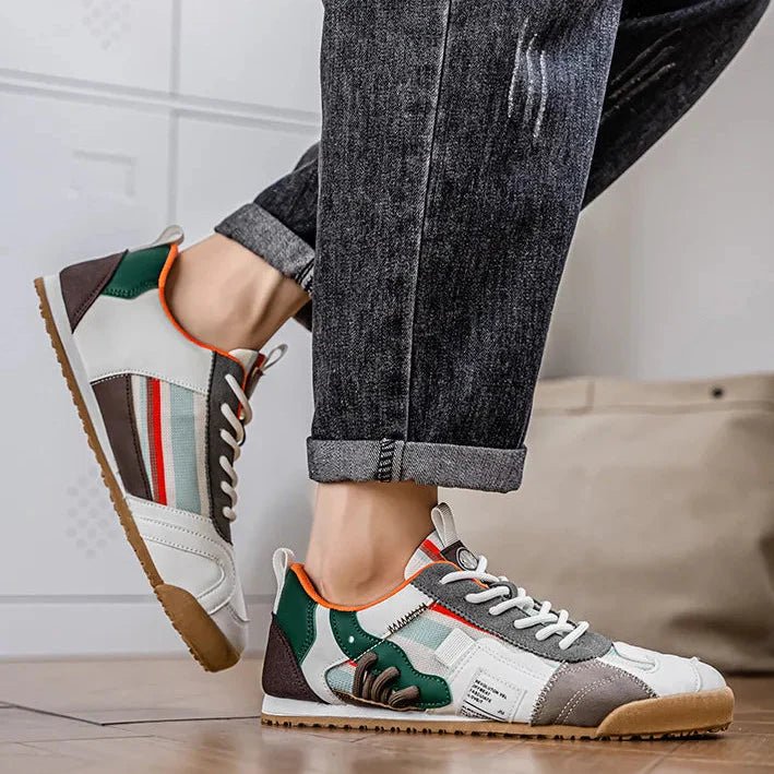 Active men's patchwork sneakers, combining trail performance with modern streetwear aesthetics.