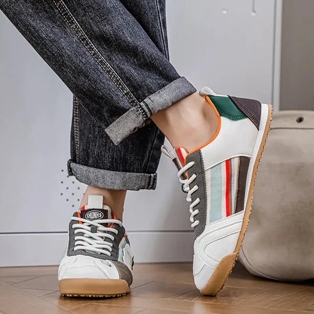 Stylish men's casual patchwork footwear, comfortable for everyday wear and urban exploration.