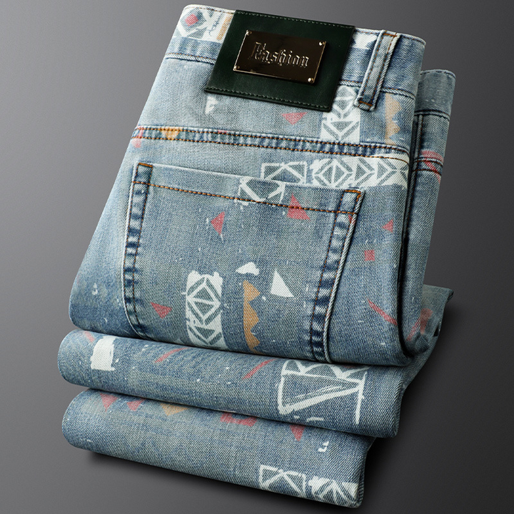 Stylish men's printed jeans featuring a unique prism and tribal pattern, ideal for retro and designer fashion.