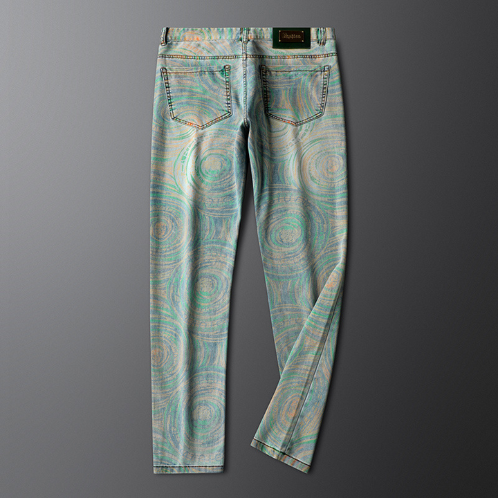 Designer men's patterned denim jeans with a unique prism tribal print, offering comfortable and stylish retro fashion.