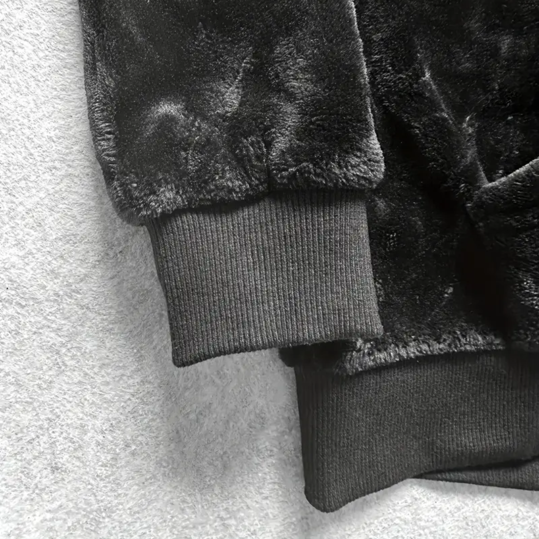 Paul men's hooded pullover, padded and fleece-lined, offering superior warmth for winter.