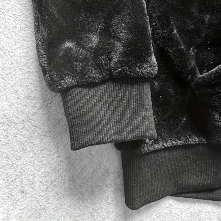 Paul men's hooded pullover, padded and fleece-lined, offering superior warmth for winter.