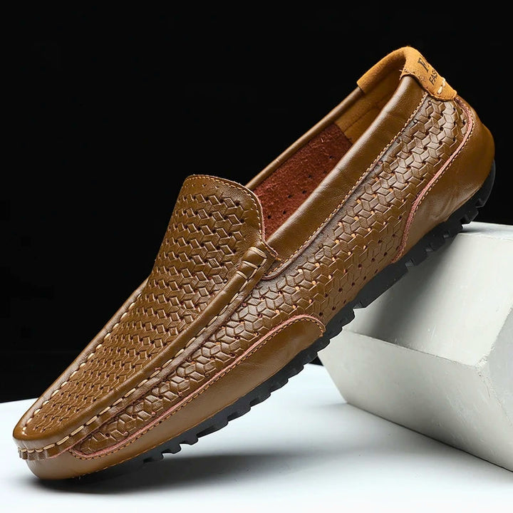 Blue perforated slip-on loafers for men, combining everyday comfort with a stylish casual design.