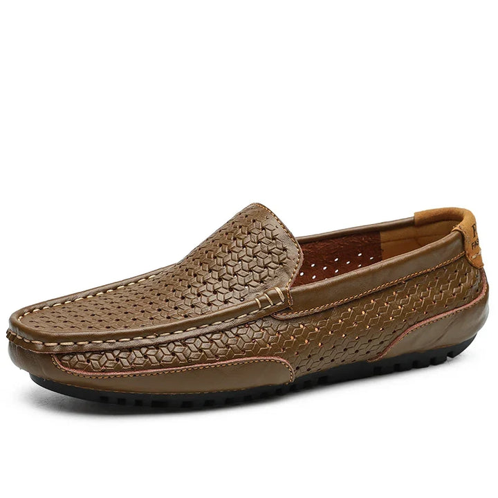 Comfortable men's perforated slip-on loafers, ideal for everyday wear and casual outfits.